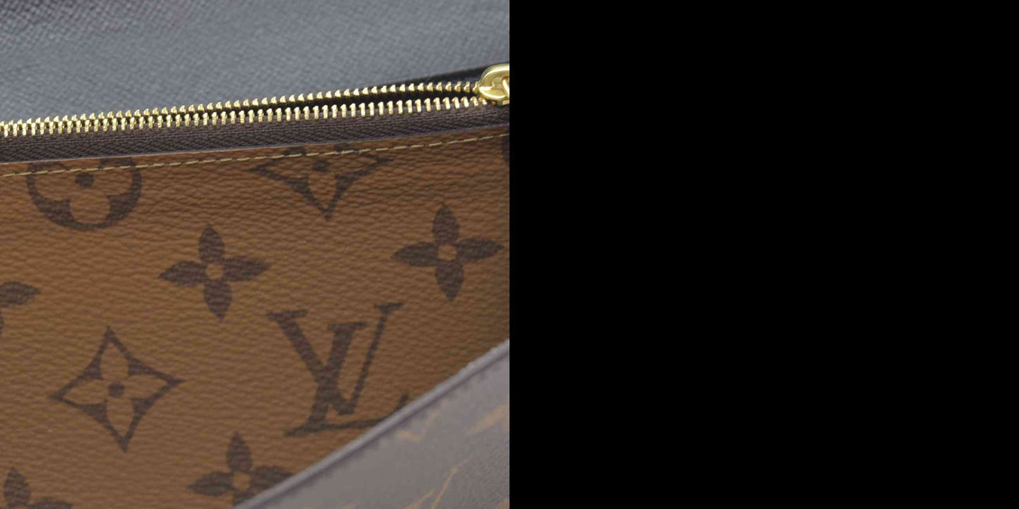 $885 RFID Louis Vuitton Reverse Monogram Giant Sarah Wallet