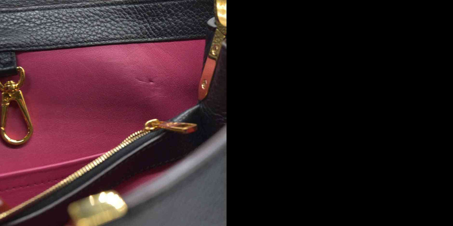 Louis Vuitton  Taurillon Capucines MM Black $7700