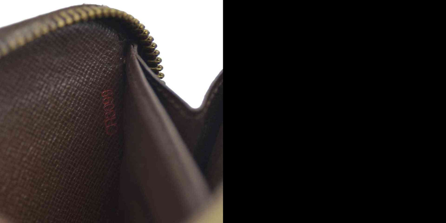 AUCTION $915 Louis Vuitton Damier Ebene Zippy Wallet