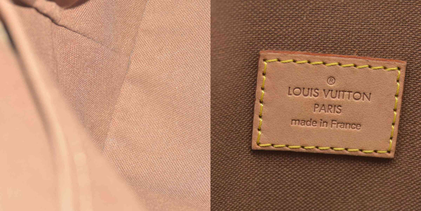 $1060 2006 Louis Vuitton Monogram Lockit PM FL0076