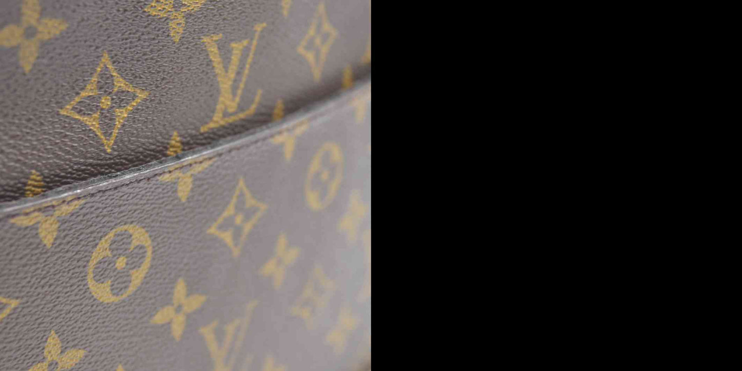 CONSIGNMENT AUCTION $1050 Louis Vuitton  Monogram Pochette Homme