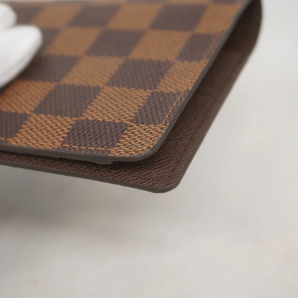 Louis Vuitton  $390 Damier Ebene Passport Cover CA2152