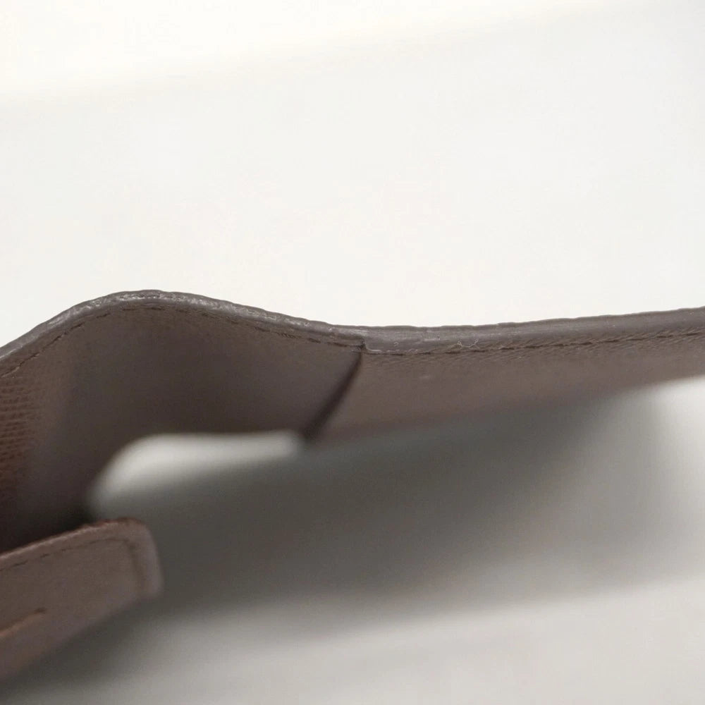 Louis Vuitton  $390 Damier Ebene Passport Cover CA2152