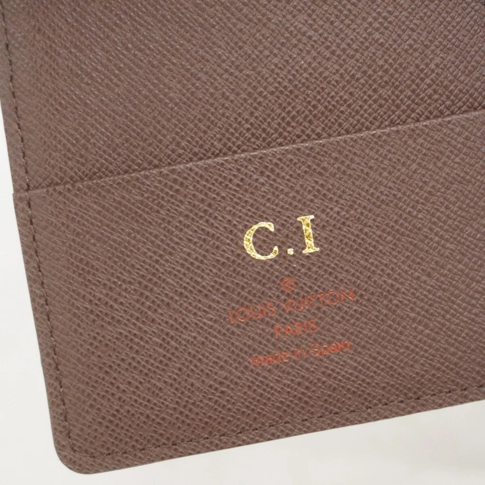 Louis Vuitton  $390 Damier Ebene Passport Cover CA2152