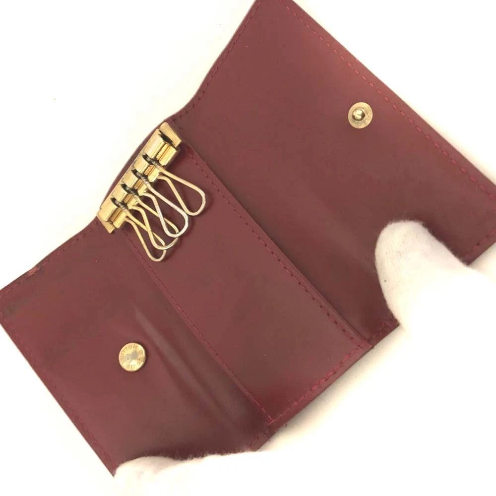 $345  Louis Vuitton Monogram Vernis Leather Multicles 4 Ring Key Case CA0057