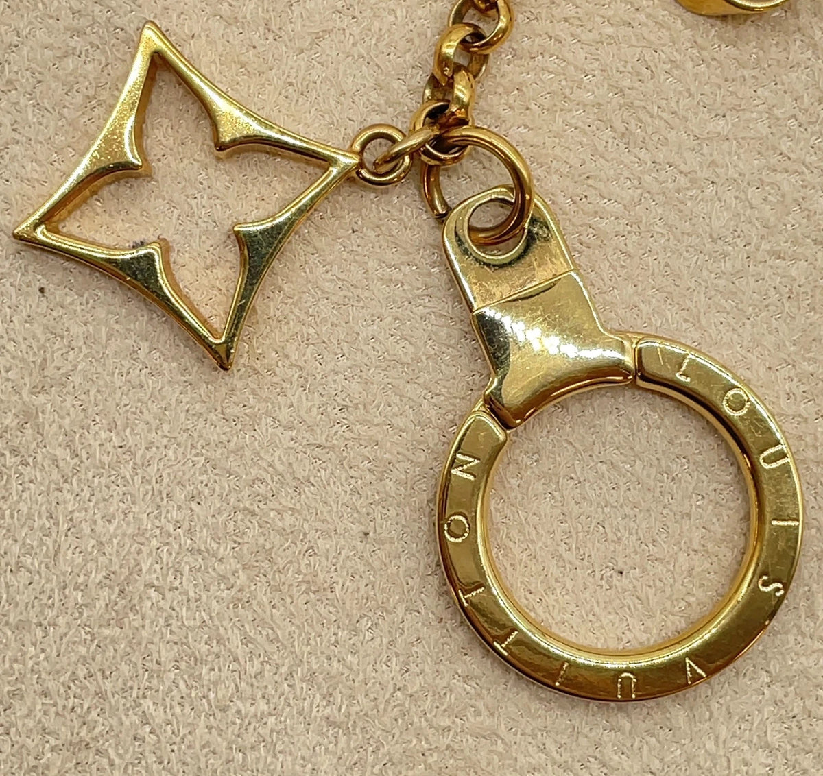 $675 Louis Vuitton Fleur de Monogram Bag Charm Chain Gold Beige