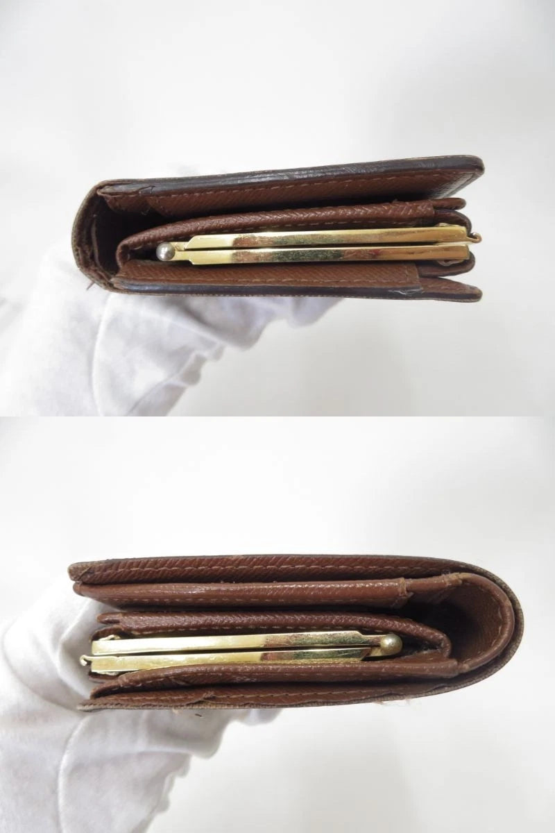 $750 2004 LOUIS VUITTON Monogram Kiss Lock Wallet TH0054